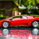 Illustration for article titled Car Week: The 90s - Diablo Rosso Edition